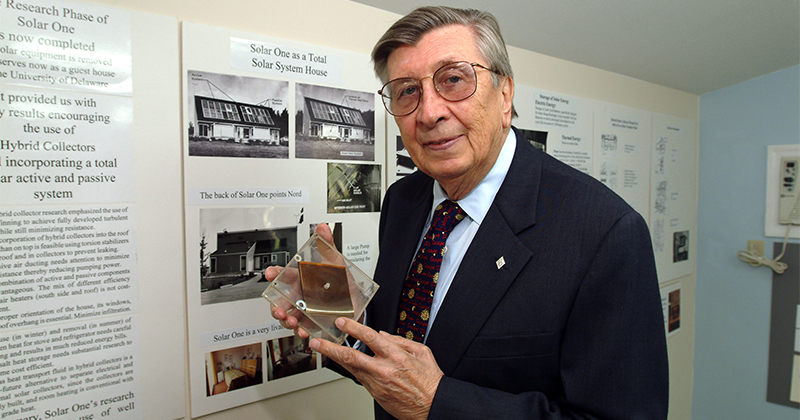 Dr Karl Boer shows the first solar cell he produced in 1968 that is still working today//he has made a museum showing the advancments made in solar cell technology at his home near Kennett Square PA