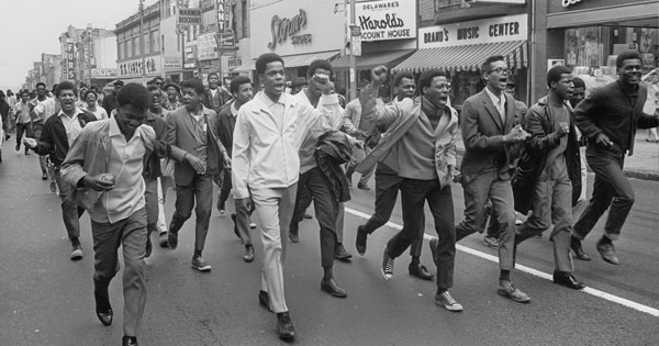 High school students march along Market Street in Wilmington to attend a memorial service for Martin Luther King Jr. in April 1968