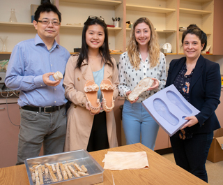 Students in the Fashion Design program design shoes made from mushrooms.