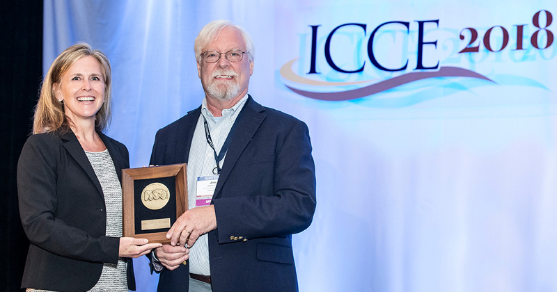 Kristina L. Swallow, the president of the American Society of Civil Engineers, presented James Kirby with the International Coastal Engineering Award on July 30, 2018. 