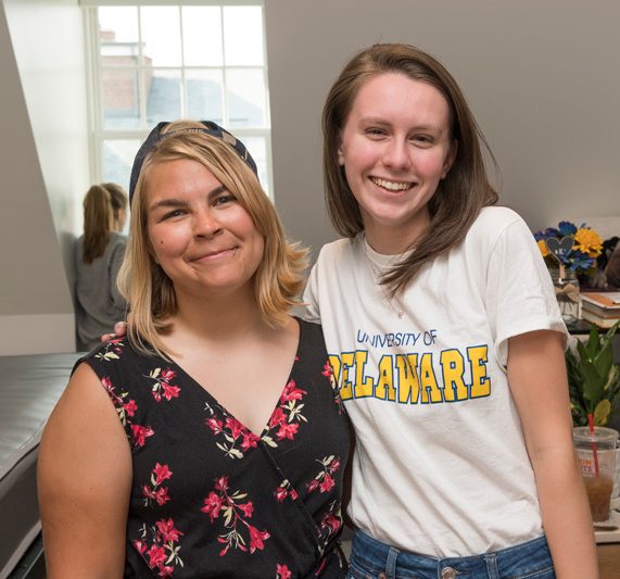 Move-In Weekend, August 25th, 2018 with new freshman students and their families setting up their dorms for the first time. Ashley Hengstefer and her roommate Bryn Kolmansberger stand together in their room. 