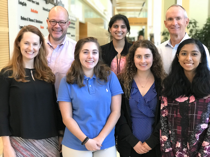 Students in the UD summer program share their experiences during a lunch with NUCLEUS supporter Tom Hofmann ’73. From left are Amanda Purdy and Glenn Rall of Fox Chase, Carissa Walkosak, Yasmin Mann, Elizabeth Habash, Hofmann and Deeanne Almeida.