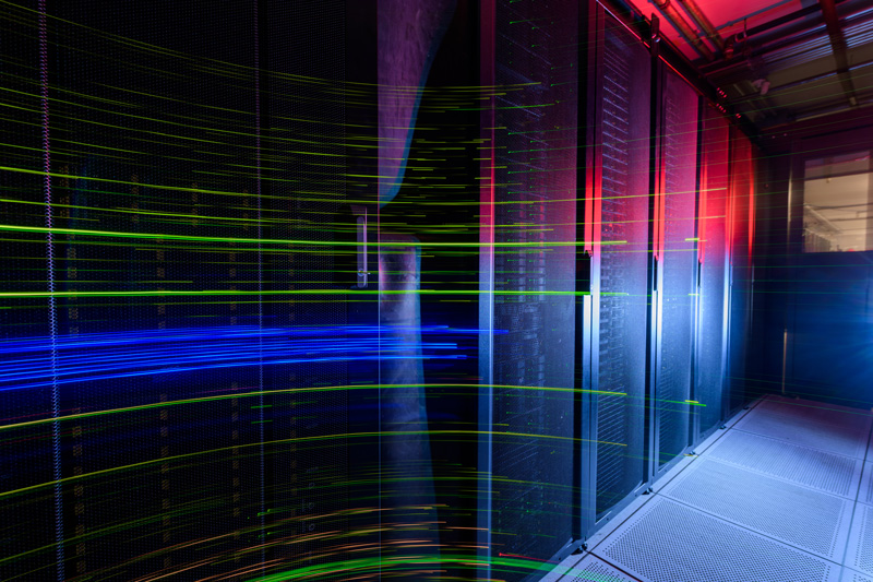 IT-Server_Cluster_Blinkenlights-120718 Various computing and storage clusters in IT's South Chapel Street Computing Center with some panning, slow sync, and shutter dragging to connote a sense of "speed" and nifty techie stuff. - (Evan Krape / University of Delaware)