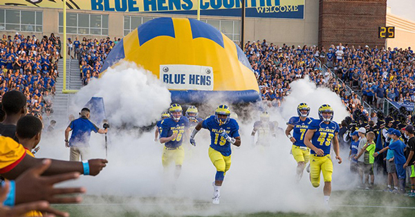 Delaware football team runs on to field at Delaware Stadium Delaware Stadium. Photo used for parking stories