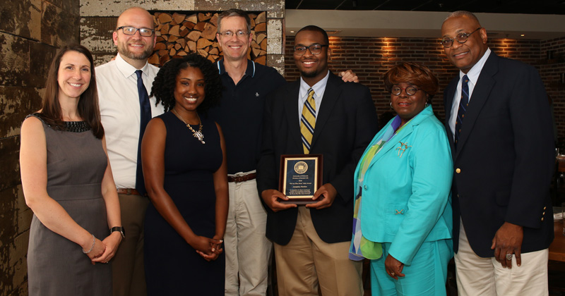 Adolphus Fletcher (third from right) was named the 2018 winner of the George and Margaret Collins Seitz Award. Attending the luncheon in his honor were, left to right, Meaghan Davidson (assistant dean of students), Adam Cantley (interim dean of students), Latoya Watson (academic assistant dean), David Teague (professor), Adolphus Fletcher and his parents, Regina and Adolphus II.