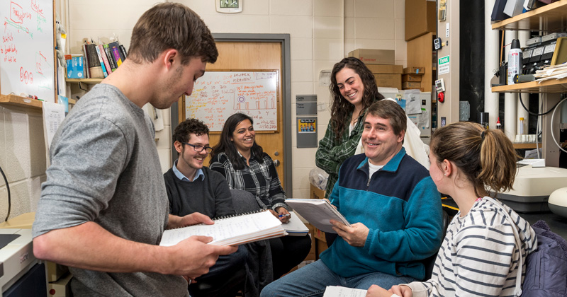University of Delaware Deni Galileo, associate professor of biological sciences, meets regularly with the students in his lab, many of whom are undergraduates working for the first time on high-level cancer research. This meeting from spring semester included (left to right): seniors Kyle Plusch and Alex Stubbolo, doctoral student Reetika Dutt, junior Michaela Scanlon, Galileo and senior Camryn Bernheimer.