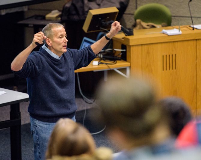 Dan Leathers, a professor in the School of Marine Science and Policy and of Geography, teaching a meteorology course in Smith Hall. - (Evan Krape / University of Delaware)