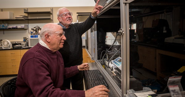 John Rabolt and D. Bruce Chase are pictured in the University of Delaware’s Advanced Materials Characterization Lab, which features equipment for X-ray diffraction, thermal analysis, porosity and particle size, vibrational spectroscopy and mass spectrometry. 
