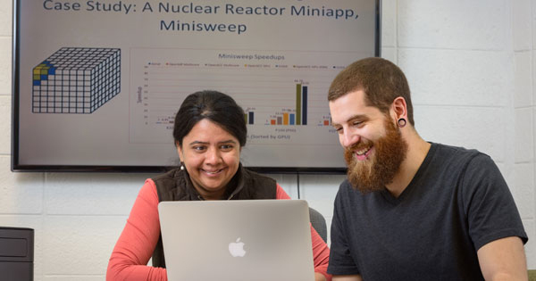 Sunita Chandrasekaran, an assistant professor in computer and information sciences at the University of Delaware, and Robert Searles, a doctoral student in computer science, have modified a miniapp using OpenACC.