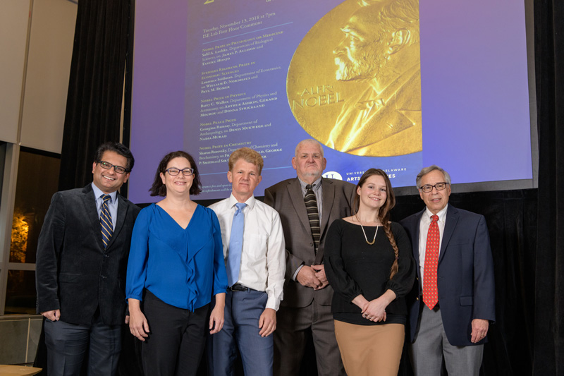 2018 Nobel Symposium with presentations given by UD experts on this year's Nobel Prize winners and their work. Presenting were (from left): Salil A. Lachke (on the Nobel Prize in Physiology or Medicine), Sharon Rozovsky (on the Nobel Prize in Chemistry), Laurence Seidman (on the Sveriges Riksbank Prize in Economic Sciences), John Jungck (emcee and organizer), Georgina Ramsay (on the Nobel Peace Prize), and  Barry C. Walker (on the Nobel Prize in Physics),. - (Evan Krape / University of Delaware)