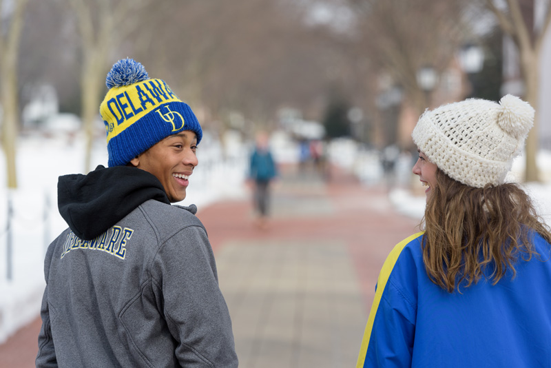 Students in the snow on Main Campus following the first snowfall of 2016. Photographed for Development and Alumni Relations use. - (Evan Krape / University of Delaware)