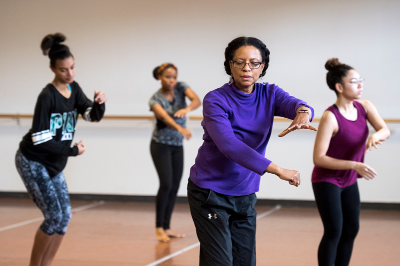 Lynnette Overby (second from right) leads a rehearsal in UD’s dance studio of “Dave the Potter,” a collaborative, multidisciplinary performance project that premiered at UD in 2014, with Overby as the art director and choreographer.