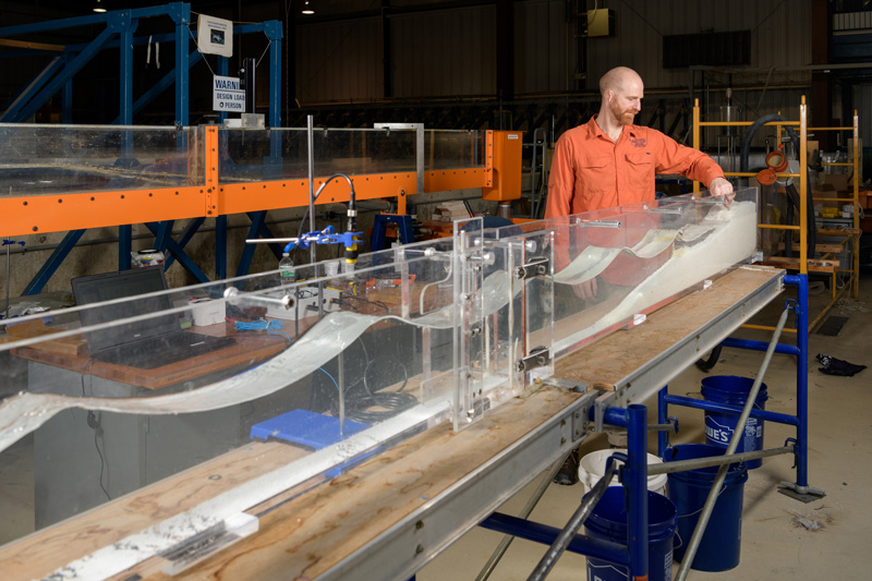 COE-CEE-Puelo_Wave_Flumes-031319 Professor of Civil and Environmental Engineering Jack Puleo studies how sand dunes erode during extreme waves and storm surges. He and several of his students have been constructing wave flumes which model the land / shore interaction and delivering them to 12 schools across the Mid-Atlantic. - (Evan Krape / University of Delaware)