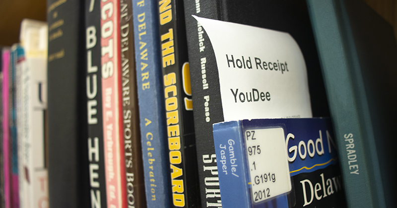 Books waiting to be picked up in Morris Library.