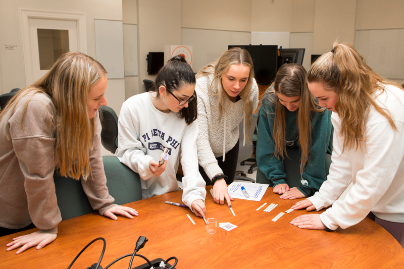 CAS-PSYCH-Escape_Room_Learning-120519 Beth Morling, along with another instructor, created an escape room for a required class, Research Methods. This first annual event took place in Memorial Hall on December 5th, 2019, where students solved a series of puzzles, several of which required them to use their research methods knowledge.