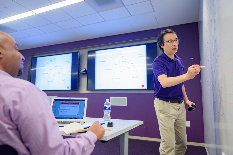 Xiao Fang, a professor in Business and Economics Accounting and Management Information Systems (MIS), teaching a certificate course on Data Science at the JPMorgan Chase (JPMC) campus in Christiana, Delaware. JPMC has partnered with the Alfred Lerner College of Business and Economics to offer their employees a unique certificate opportunity with on-location classes.