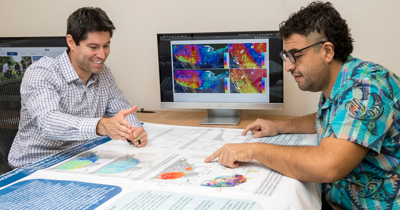 Rodrigo Vargas & Mario Guevara, College of Agriculture & Natural Resources, are studying the mosture content in soil as projected by satelite radar and are putting that information into easy to read graphs.