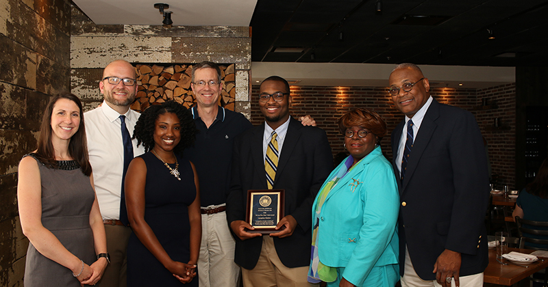 2018 Seitz Award winner Adolphus Fletcher poses with his family and members of the selection committee