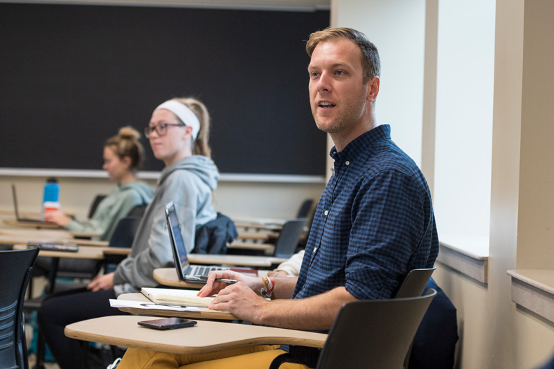 Dustin Morris teaches a English course traditionally known at E110 in a different fashion than was taught in the past which focuses on stronger writing skills that the students can use throughout their 4 years of college. (Releases were obtained on everyone in the class.)