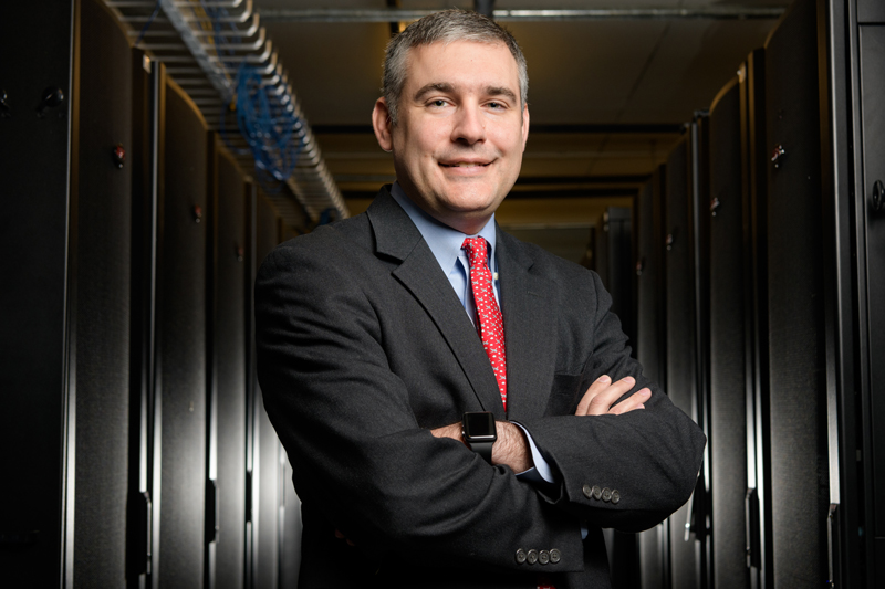 Kenneth Kurz, Chief Information Security Officer for UD's Information Technology. Photographed amongst racks of server and networking equipment in the Chapel Street Computing Center for a UDaily article. - (Evan Krape / University of Delaware)