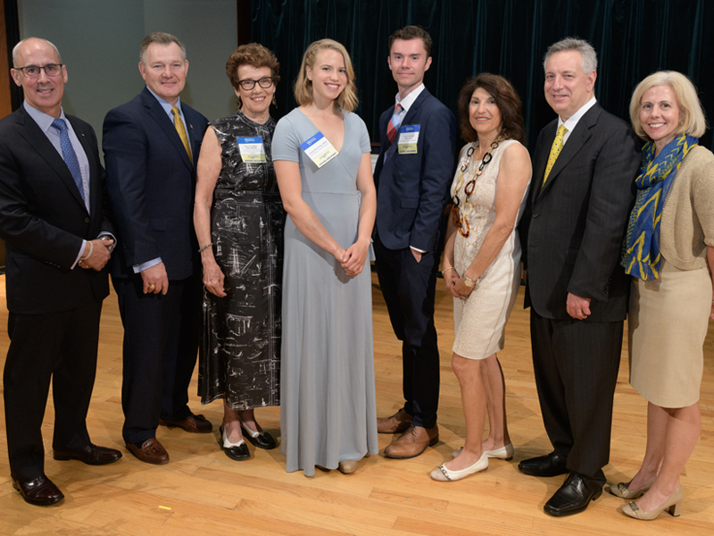 Alumni Weekend 2018: University of Delaware Alumni Association (UDAA) Awards Celebration. Pictured, from left: UDAA President Steve Beattie, BE87; Outstanding Alumni Award winners Kenneth C. Jones, BE80, and Mary Ann Hangen Blair, AS66, BE82M; Emalea Pusey Warner awardee Laura K. Donohue, AG18; Alexander J. Taylor, Sr. awardee Zachary A. Sexton, AS18, EG18; Alumni Wall of Fame inductee Marie E. Pinizzotto, BE08M; UD President Dennis Assanis; and Alumni Wall of Fame inductee Donna M. Fontana, BE85. Additional Alumni Wall of Fame inductee Vance V. Kershner, EG79, was unable to attended the ceremony. - (Evan Krape / University of Delaware)