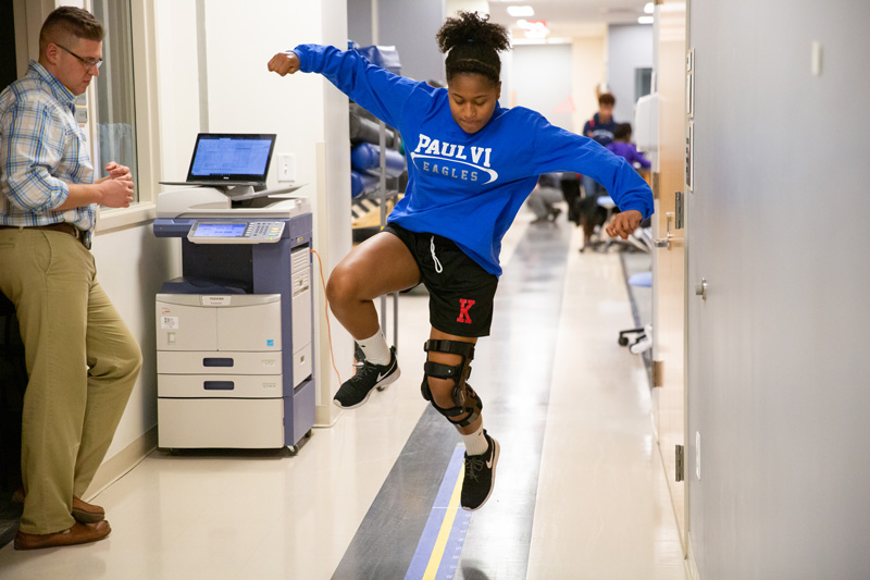 Kennedi Avent, daughter of University of Delaware alumna Tonya Avent, receives physical therapy from Greg Seymour for a torn PCL. Avent travels to the Delaware PT Clinic from her home in New Jersey on a monthly basis for progress benchmarks.