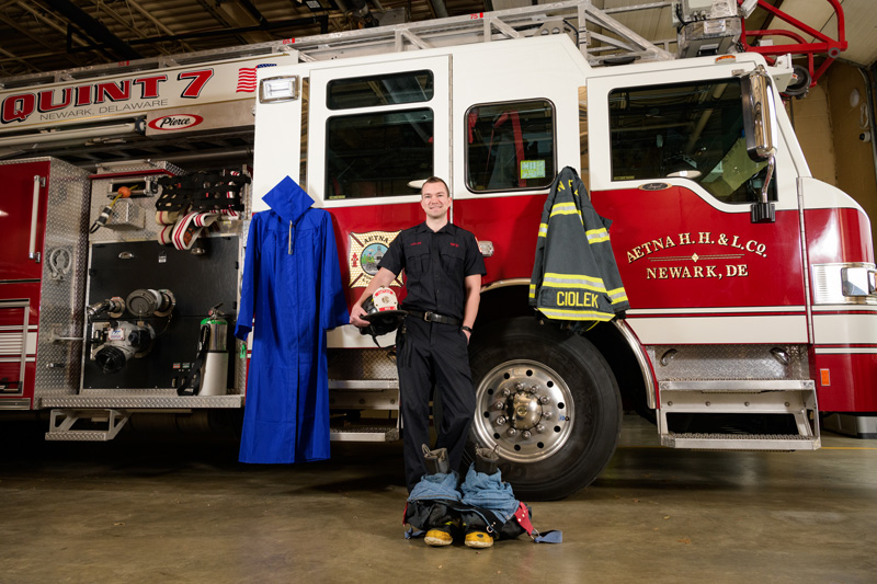 Lerner-Ciolek-MBA_Grad-Firefighter-050319 Alex Ciolek graduated from UD in 2016, earning dual degrees in Political Science and in Economics, he is about to graduate from the Lerner college again in 2019 with his Master of Business Administration. Through that time he has also been a volunteer Firefighter / EMT with the Aetna Hose, Hook and Ladder company, serving as an engine captain for the past year. After graduation he will be commissioning in the Air Force Officer Training School to put his logistics training to use. - (Evan Krape / University of Delaware)