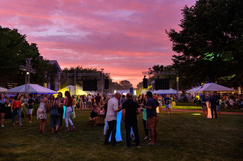 Alumni Weekend 2019 - "Dela-Bration" on the North Green. The centerpiece of Alumni Weekend, Dela-bration (formerly "mug night") gathered together thousands of alumni as one giant, open-air party featuring a live band, food, beer, and entertaining games. - (Evan Krape / University of Delaware)