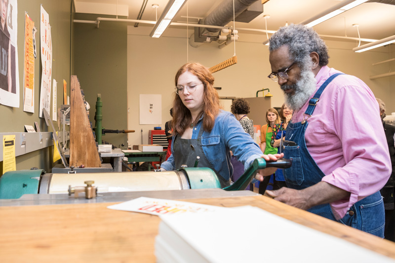 The Center for Materials Culture sponsors a workshop for African American printers/publishers with Amos Kennedy, a visiting printing press expert. (Photo releases were obtained.)