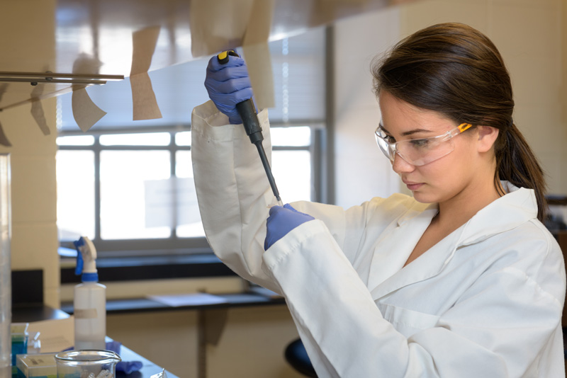 Various photos of Biological Sciences students taking classes, working in labs, and meeting on the steps of Wolf Hall. - (Photographic Services / University of Delaware)