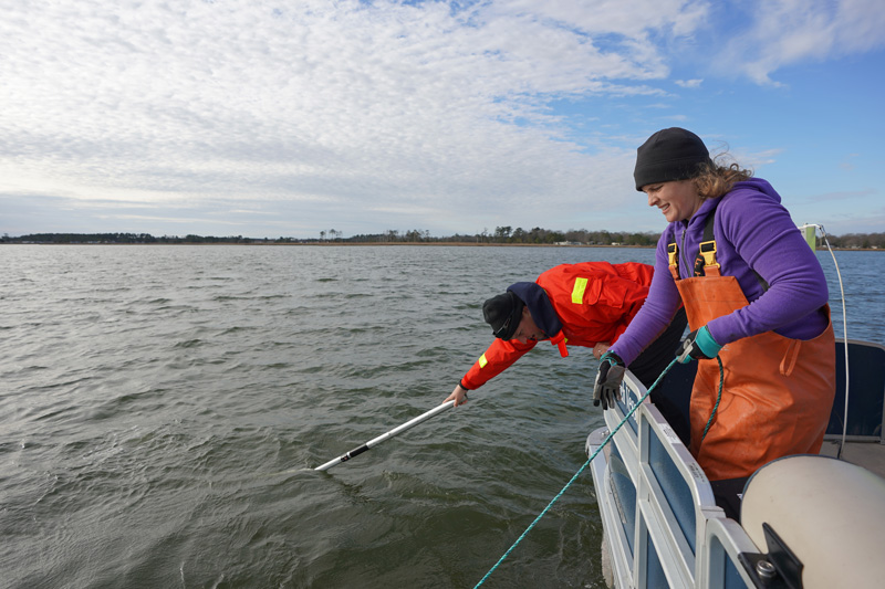 Kate Fleming (DESG), Art Trembanis (CEOE), Grant Otto (CEOE student) and Vince Capone (Black Laser Learning) search for ghost, or abandoned, crab pots in the Delaware Inland Bays aboard the R/V Dogfish