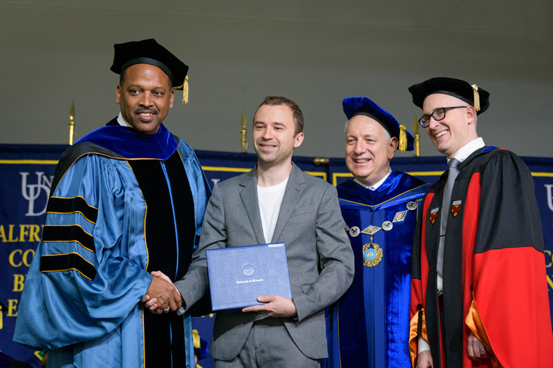 The 2019 Doctoral Hooding Ceremony, May 31st, 2019 under the direction of Mary Martin, Graduate Studies; President Dennis Assanis; and all Deans of the colleges. (Signage was posted at the start of the event and announcement before the ceremony.) - (Evan Krape / University of Delaware)