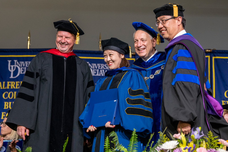 The 2019 Doctoral Hooding Ceremony, May 31st, 2019 under the directio of Mary Martin, Graduate Studies, President Dennis Assanis and all the Denas of the colleges. (Signage was posted at the start of the event and announcement before the ceremony.)