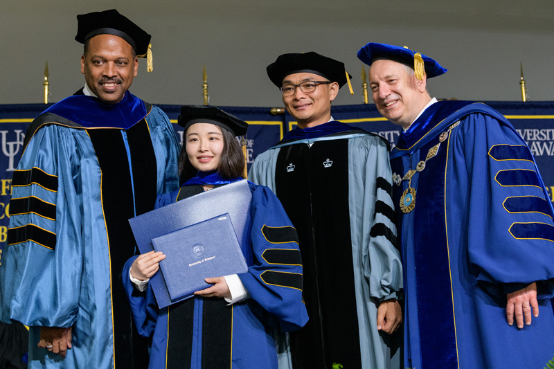 The 2019 Doctoral Hooding Ceremony, May 31st, 2019 under the direction of Mary Martin, Graduate Studies; President Dennis Assanis; and all Deans of the colleges. (Signage was posted at the start of the event and announcement before the ceremony.) - (Evan Krape / University of Delaware)