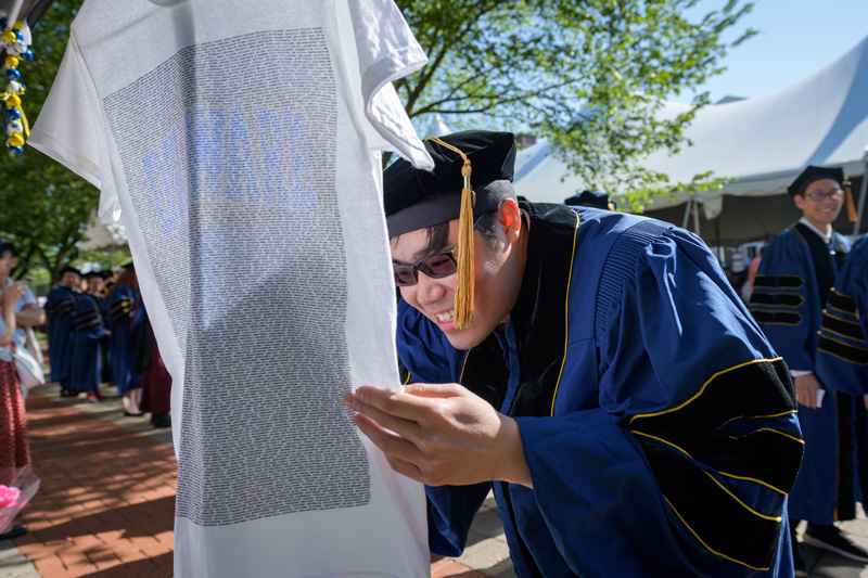 The 2019 Doctoral Hooding Ceremony, May 31st, 2019 under the direction of Mary Martin, Graduate Studies; President Dennis Assanis; and all Deans of the colleges. (Signage was posted at the start of the event and announcement before the ceremony.) - (Evan Krape / University of Delaware)