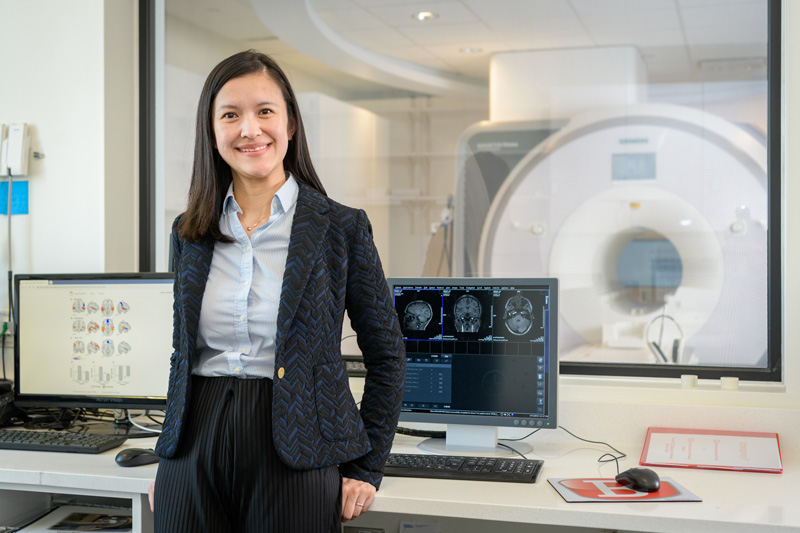Zhenghan Qi is an assistant professor in Linguistics and Cognitive Science photographed with the Functional Magnetic Resonance Imaging scanner in UD’s Center for Biomedical and Brain Imaging. Professor Qi used fMRI in her research on the neurobiological organization of language in the human brain - how a first language is acquired by infants and additional languages are acquired by adults - and neurodevelopmental disorders of language (autism spectrum disorder, dyslexia, language impairment, and schizophrenia). - (Evan Krape / University of Delaware)