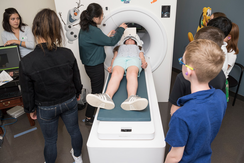 5th grade students from the Independence School participate in an outreach STEM program studying brain science and learning how their brains work.  (UD minor releases were collected.)