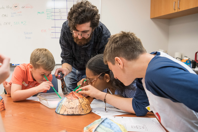 5th grade students from the Independence School participate in an outreach STEM program studying brain science and learning how their brains work.  (UD minor releases were collected.)