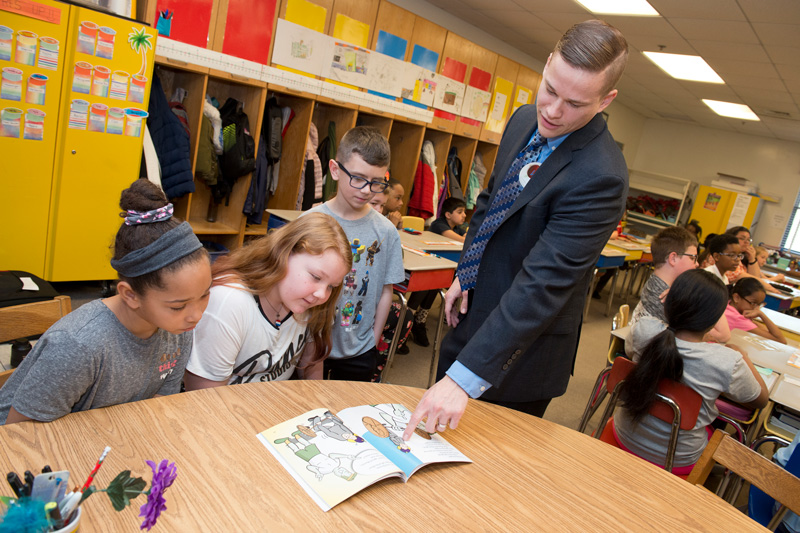 Teach Children to Save Day held at Thurgood Marshall Elementary School in Karen Fredericks 4th grade class on April 8, 2019. Bank Volunteer, Everet Zicarelli, a senior internal auditor at Sallie Mae Bank, CEEE donor, a Lerner alum and a Thurgood Marshall alum, volunteered to read a book, share a lesson and take questions from students explaining the importance of saving.