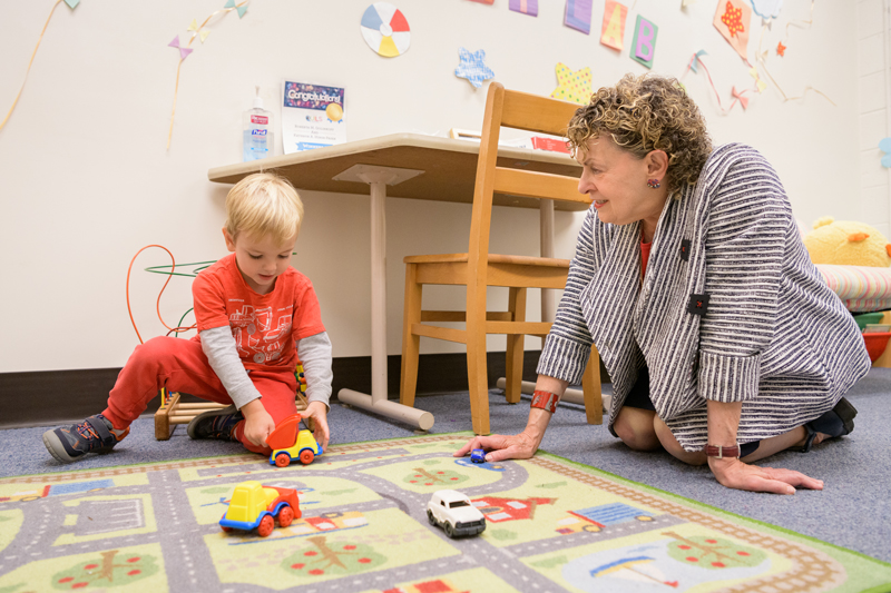 Environmental and posed photos of Roberta Golinkoff, the Unidel H. Rodney Sharp Chair of the School of Education and a professor in Linguistics & Cognitive Science and Psychological & Brain Sciences.