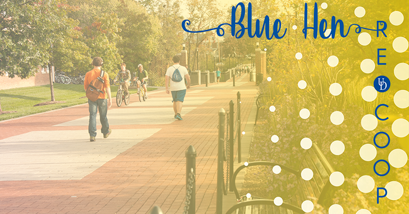 Students walk on the University of Delaware campus themed under the Blue Hen Re-Coop Day filter