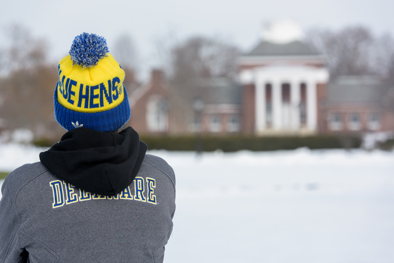 Students in the snow on Main Campus following the first snowfall of 2016. Photographed for Development and Alumni Relations use. - (Evan Krape / University of Delaware)