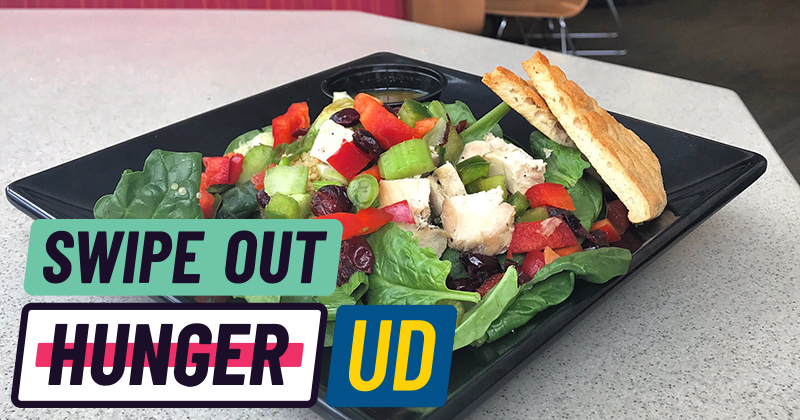Salad in UD dining hall with Swipe Out Hunger logo