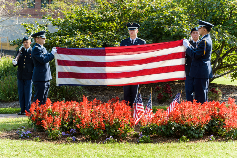 Joint University of Delaware and City of Newark 9/11 Commemoration ceremony held in Olan Thomas Park. The ceremony program included the national anthem being sung by Benjamin Von Duyke and William Walker, an invocation given by Chaplain John Groh, City of Newark Mayor Polly Sierer, a brief talk by University of Delaware Provost and veteran Domenico Grasso, remarks and remembrances by UD student veteran Sgt. Stephen McGuire, representative Paul Baumbach, and flag folding ceremony. - (Evan Krape / University of Delaware)