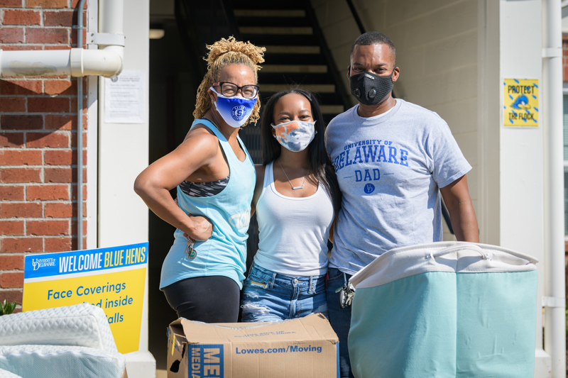 UD's first day of a new, multi-day staggered move-in designed to accommodate the social distancing and health considerations required to safely bring students back to school amidst the COVID-19 pandemic. Only about 1,300 students will be returning to living in on-campus housing and their move-in has been spread across 5 days.

Pictured: Kennedy Smith (middle) is helped moving into The Courtyard Apartments by her parents