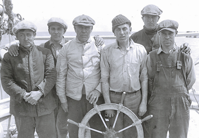 Crewmen of the oyster schooner Doris on deck in 1924