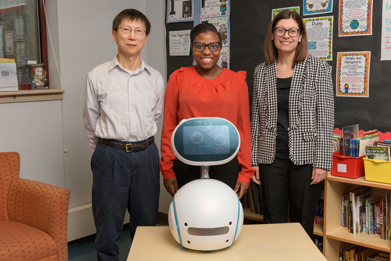 An interdisciplinary team of researchers lead by Chrystalla Mouza (Principal Investigator) and Tia Barnes (Co-PI) from the College of Education and Human Development and Chien-Chung Shen (Co-PI) from the College of Engineering, were Fall-2018 recipients of a 2-year NSF grant titled "Cybersecurity Education Using Interactive Storytelling with Social Robots" (Award Abstract #1821794). The project aims to design an approach to cybersecurity education which delivers interactive educational stories through a social robot which can autonomously interact with students. Students in UD's College School" had the change to interact with one of their prototypes, named "Zenbo", which is based on a commercially available platform. The researchers recently worked with students in the College School to record their voices for use in some of the stories Zenbo can tell.
