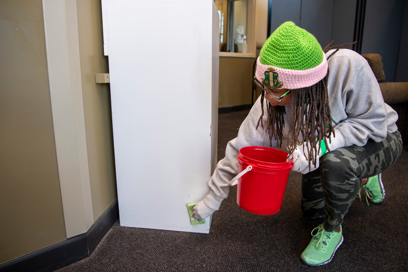 Members of the Alpha Kappa Alpha sorority like Nadja Lawrence participate in the MLK Day of Service by performing cleaning and sorting tasks at the Sunday Breakfast Mission, January 20, 2020.