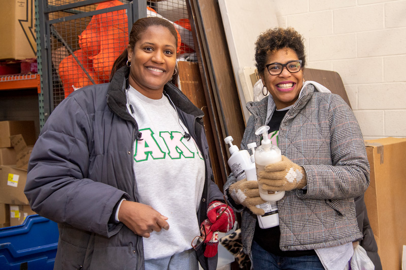 Members of the Alpha Kappa Alpha sorority participate in the MLK Day of Service by performing cleaning and sorting tasks at the Sunday Breakfast Mission, January 20, 2020.