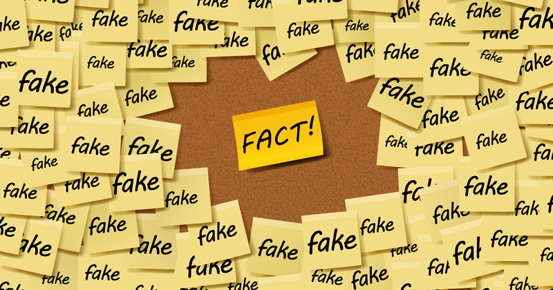 Yellow sticky notes with "fake" and "fact" words vector background. (Used clipping mask)